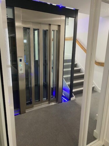 Bespoke Steel/ Glass Lift Structure with Panoramic Glazing & Led Lighting.